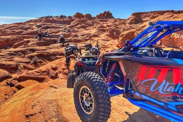 a car parked on the side of a mountain