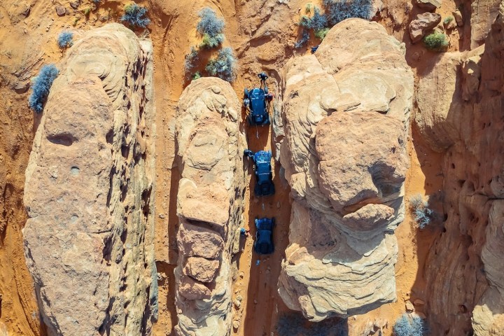 a group of people on a rock